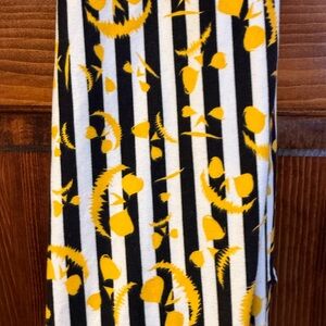 Lula Roe Halloween bland and white striped with yellow jack o lantern faces